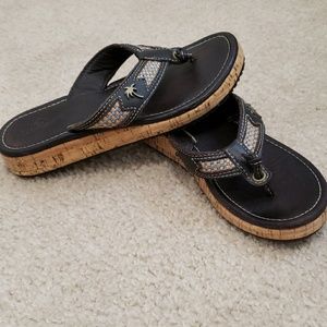 Margaritaville dark brown leather flip flops